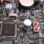 Botones de Reset y Power, junto a ellos el chip JMicron encargado del Raid IDE.
